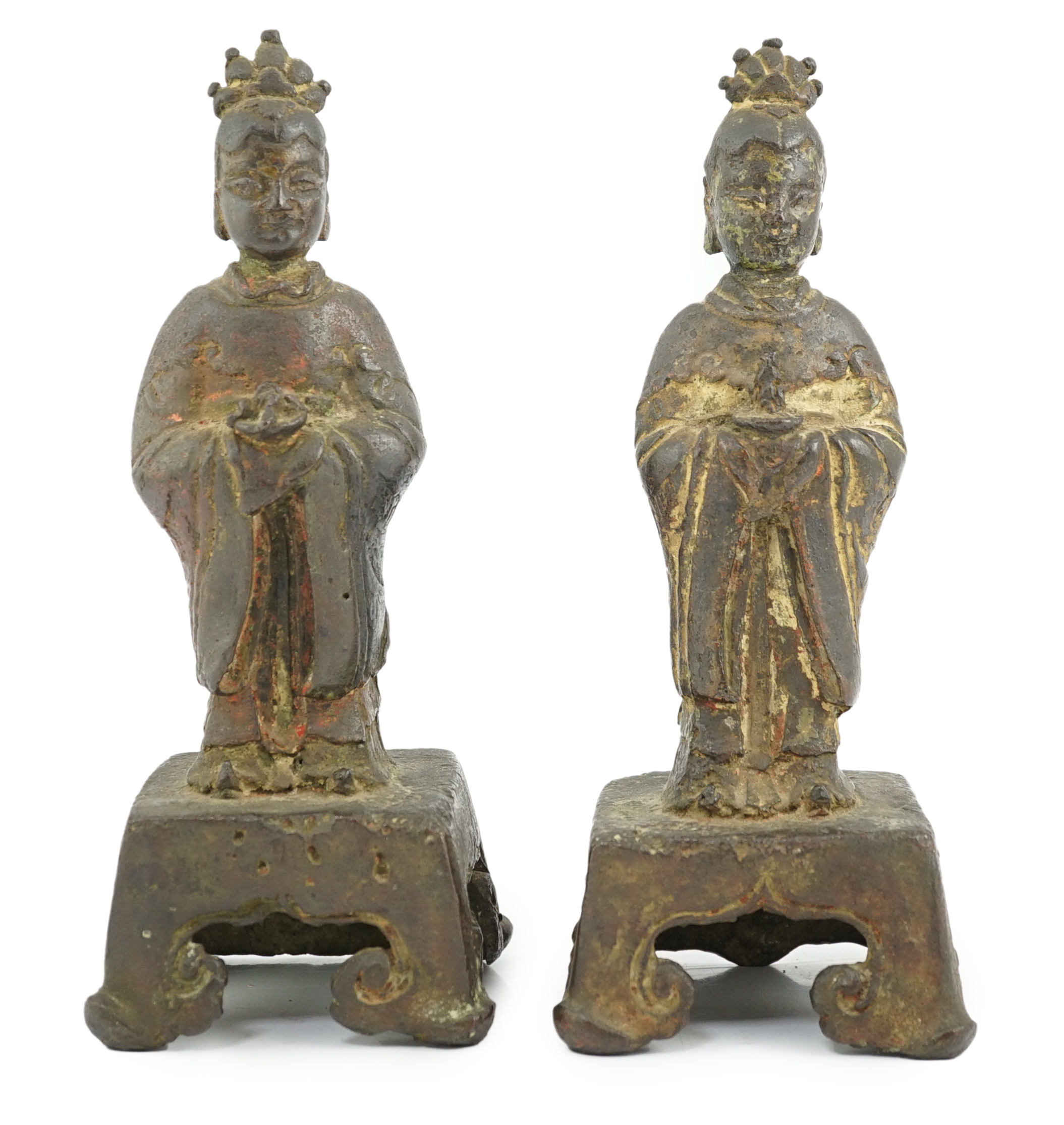 A pair of Chinese Ming bronze figures of attendants